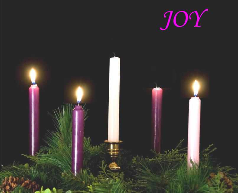 Five candles on a wreath.  Three of the candles are lit, signifying Joy and marking the third Sunday of Advent.